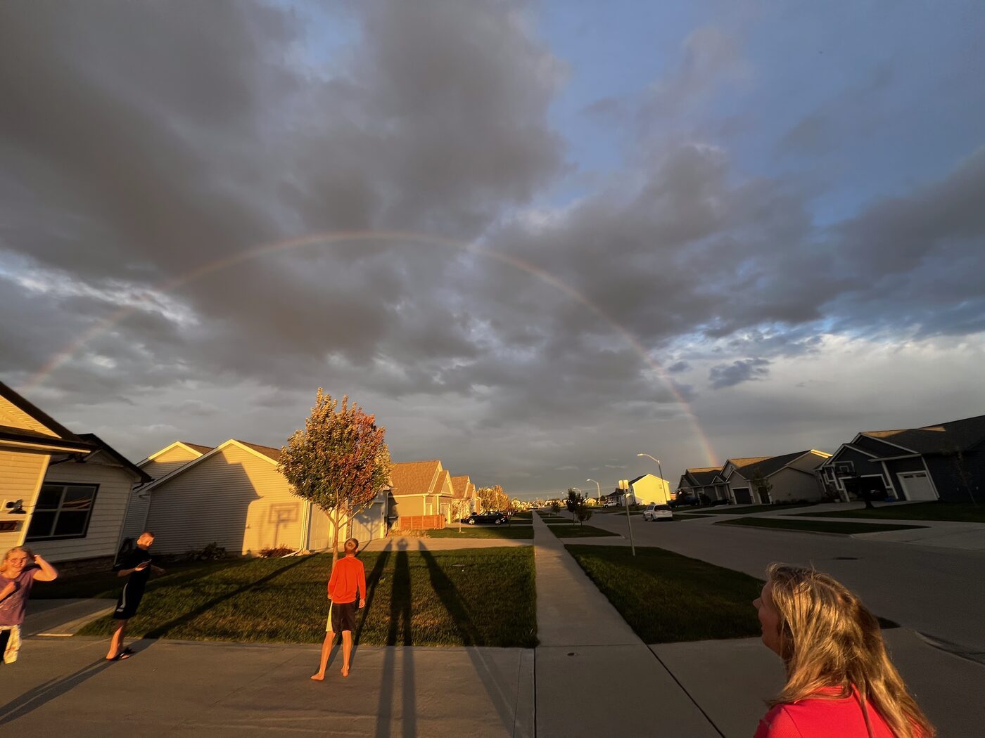 A rainbow over a Des Moines metro neighborhood after a storm.